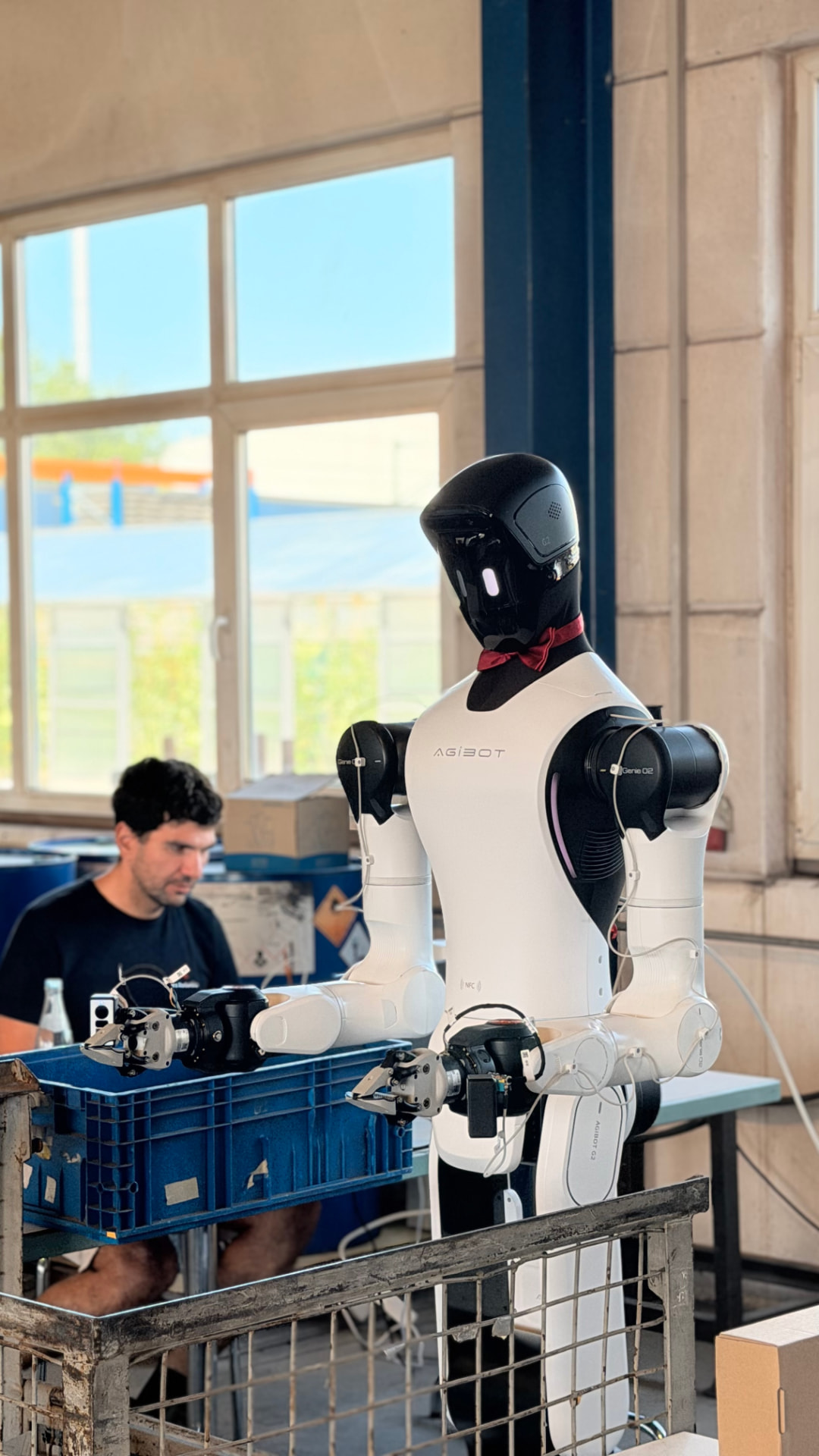 Lunes Robotics humanoid robot bin picking from a KLT container at Schweikert